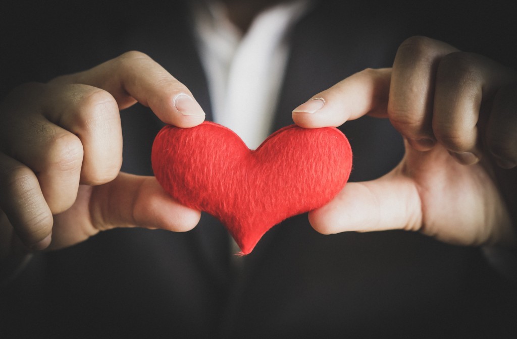 Image of hands holding heart