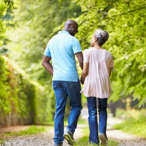 Couple walks down trail together